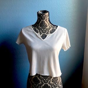 Beautiful crop top purchased in London. Soft stretchy material size 10-12. New.